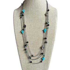 C.I.T.Y. Faux Turquoise Cross Necklace with Earrings.